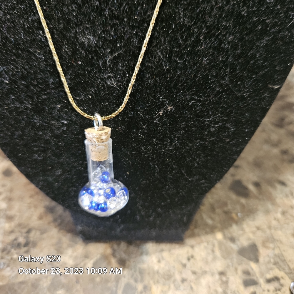 Necklace with a Ginnie bottle handmade